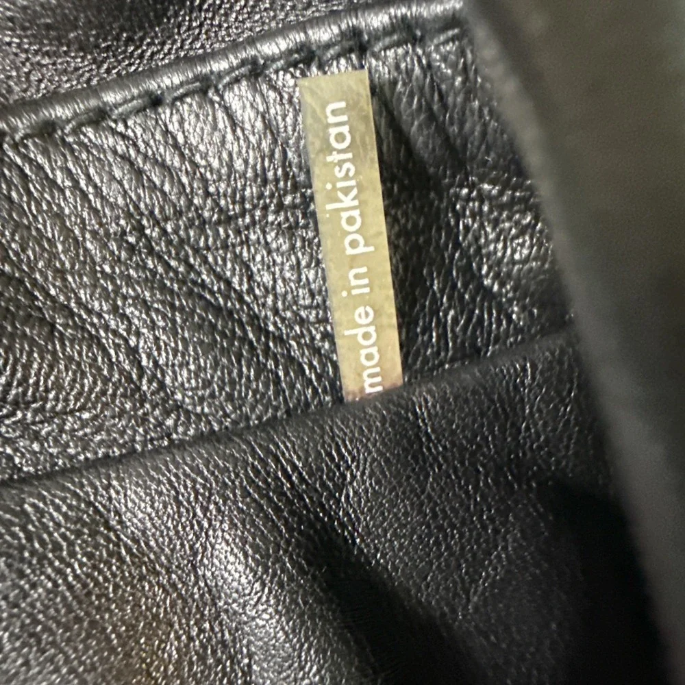 Wilsons Leather it including pockets